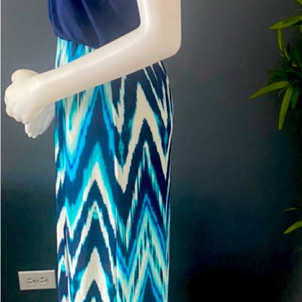Size small new with tags. Should fit a medium as well as it is loose fitting.